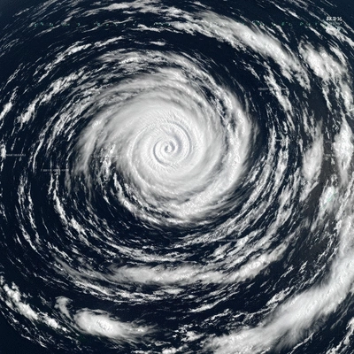 Satellite view of a swirling tropical cyclone over the ocean, with weather data overlays
